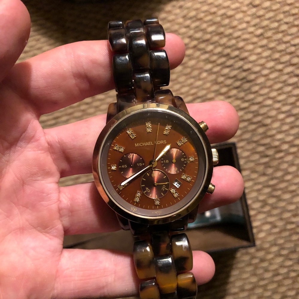 Michael kors tortoise band, gold trim